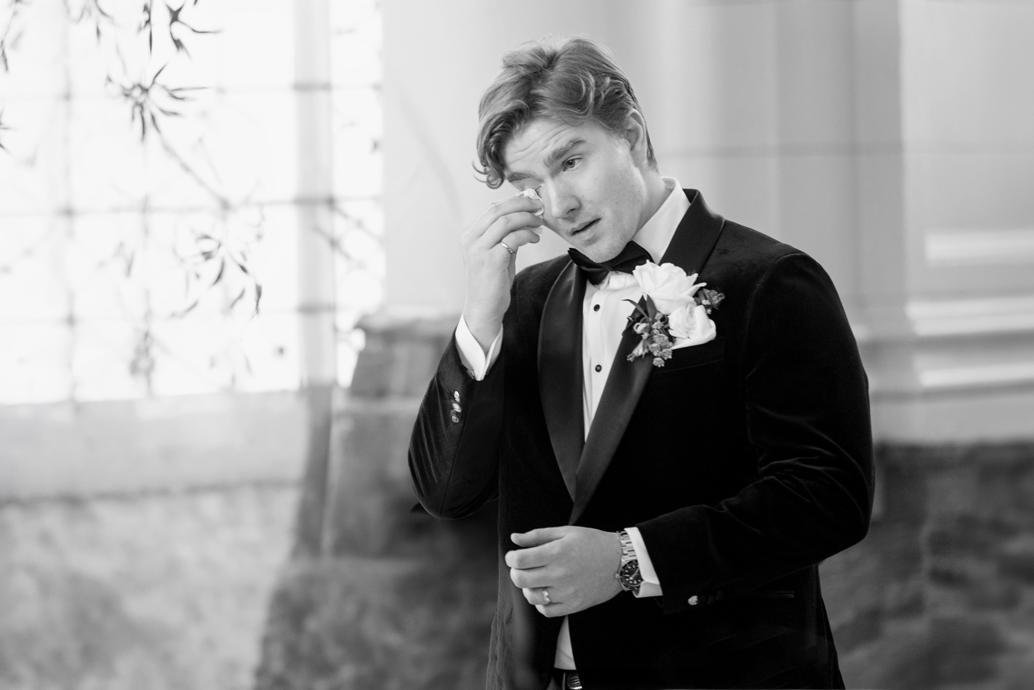 Groom reacting emotionally during a private wedding first look