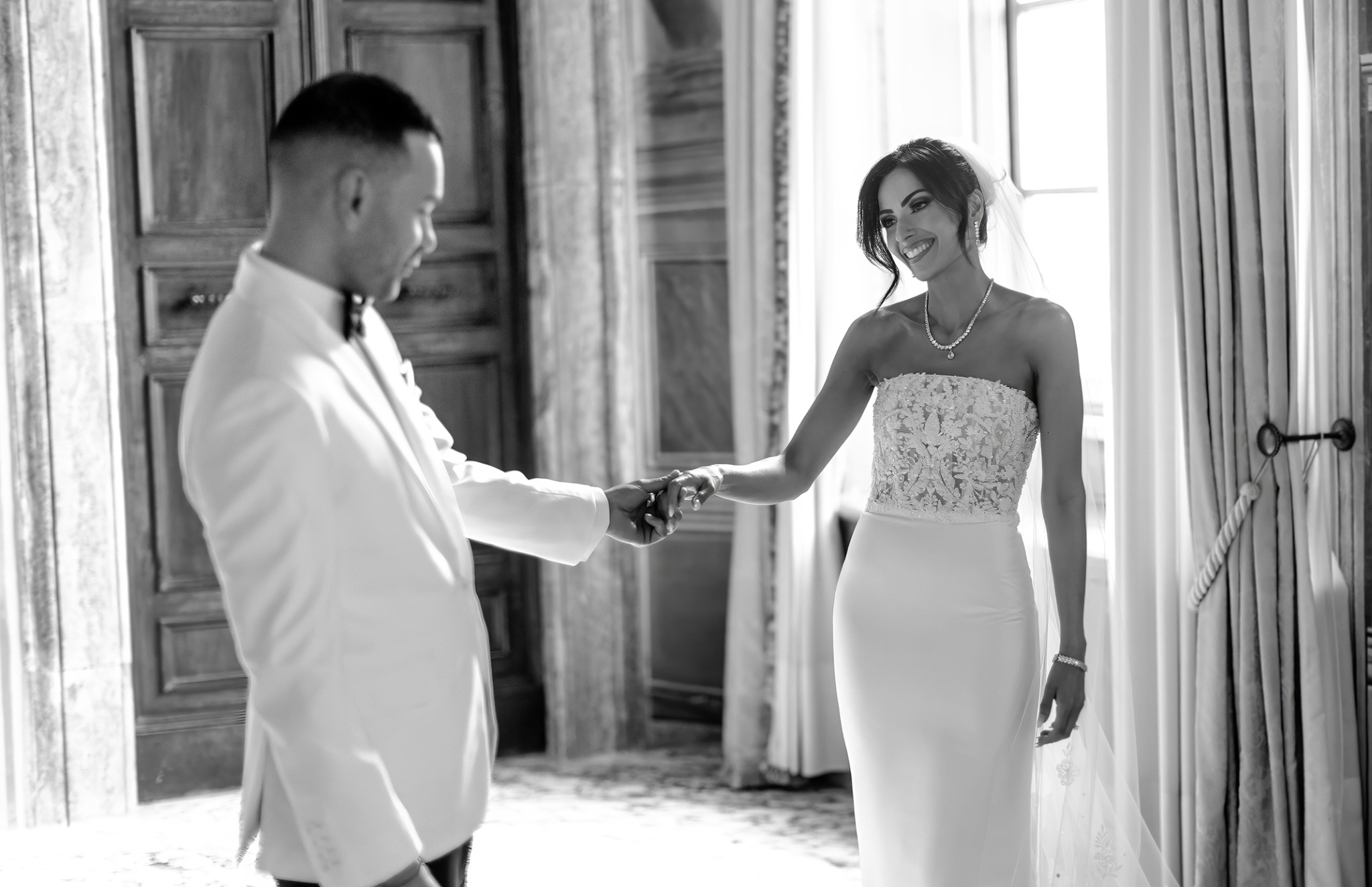 Couple sharing an emotional first look before their wedding ceremony